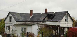 home with wind damage