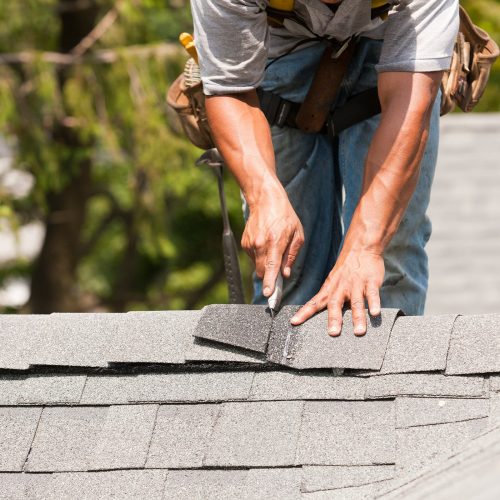 Fixing Shingles on a Residential Roof